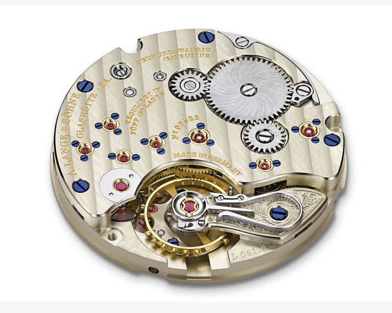 Il calibro del 1815 Up-Down. L'organo regolatore, sorretto dal coq, è l'unica parte visibile del meccanismo.